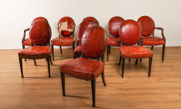 A SET OF NINE GEORGE III STYLE STUDDED ROUGE LEATHER UPHOLSTERED MAHOGANY FRAMED DINING CHAIRS (9)