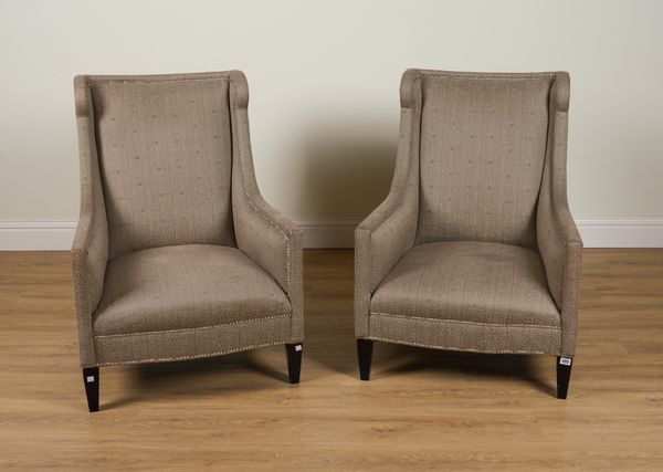 A PAIR OF MODERN EBONISED AND CHROMED STUDDED UPHOLSTERED ARMCHAIRS (2)