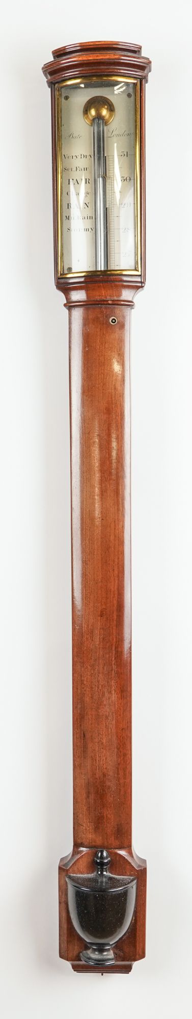 A REGENCY BOW-FRONTED BRASS-MOUNTED MAHOGANY STICK BAROMETER