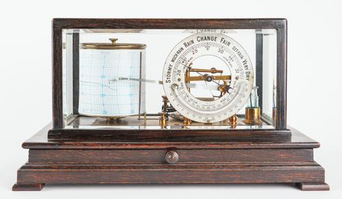 AN OAK CASED BAROGRAPH