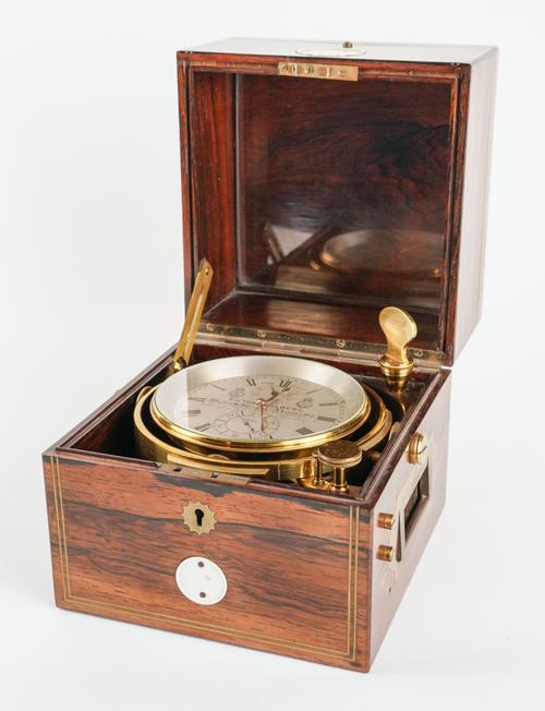 A ROSEWOOD AND BRASS-LINE INLAID MARINE CHRONOMETER