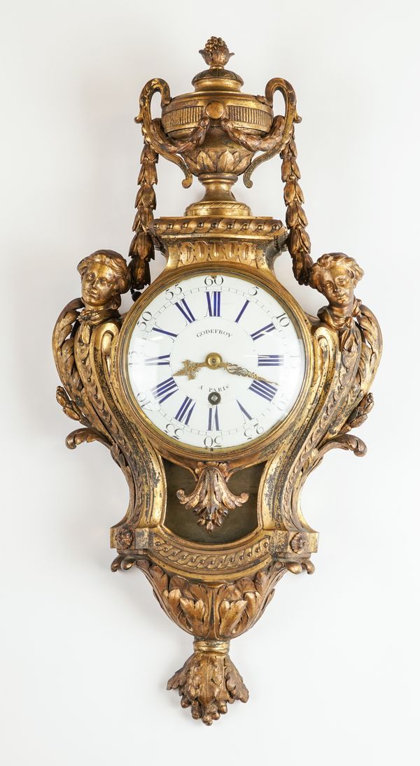 A LOUIS XVI ORMOLU CARTEL CLOCK WITH QUARTER REPEAT