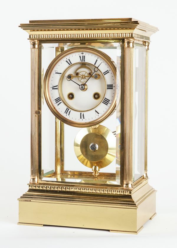 A FRENCH GILT-BRASS FOUR-GLASS MANTEL CLOCK