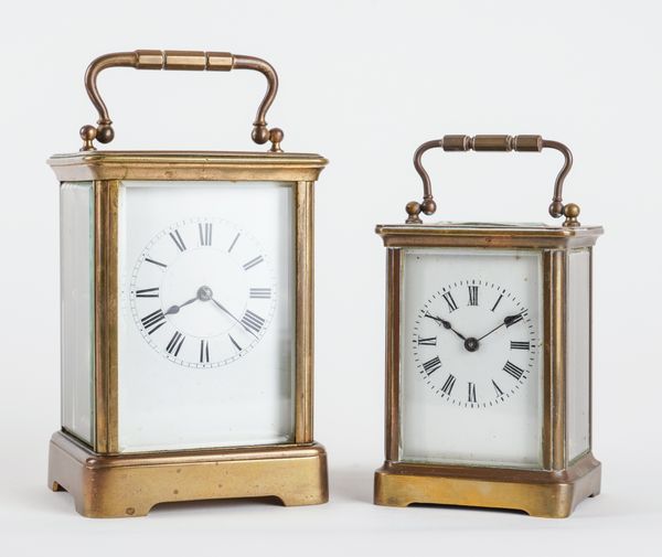 A FRENCH BRASS CARRIAGE CLOCK AND A CARRIAGE TIMEPIECE (2)