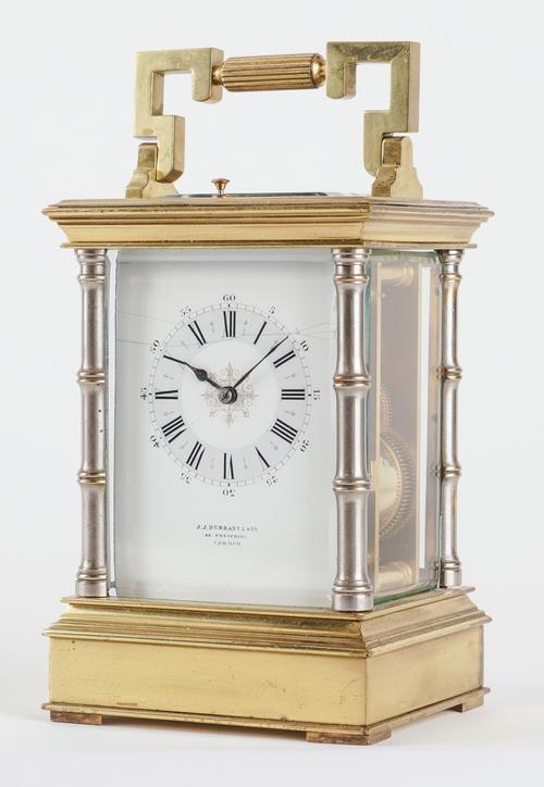 A FRENCH BRASS AND SILVERED CARRIAGE CLOCK WITH PUSH REPEAT