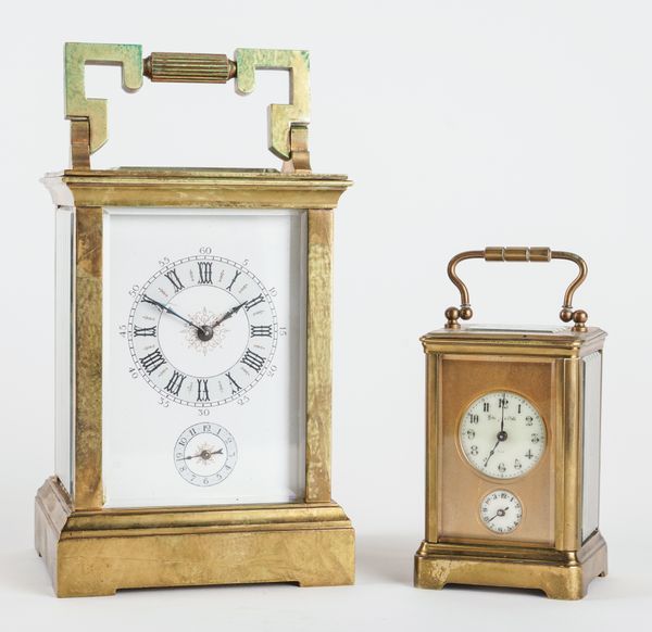 A FRENCH BRASS CARRIAGE ALARM CLOCK AND A SMALLER CARRIAGE ALARM TIMEPIECE (2)