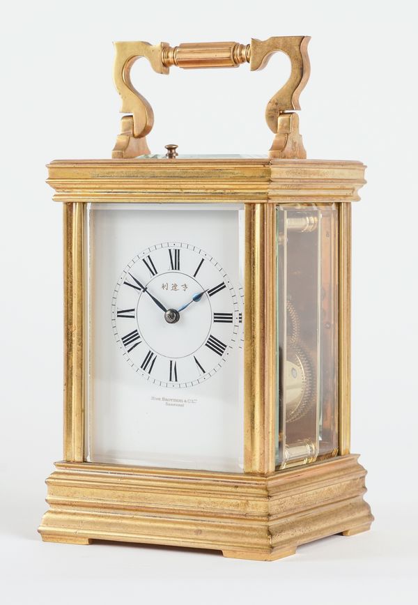 A FRENCH BRASS CARRIAGE CLOCK WITH PUSH REPEAT