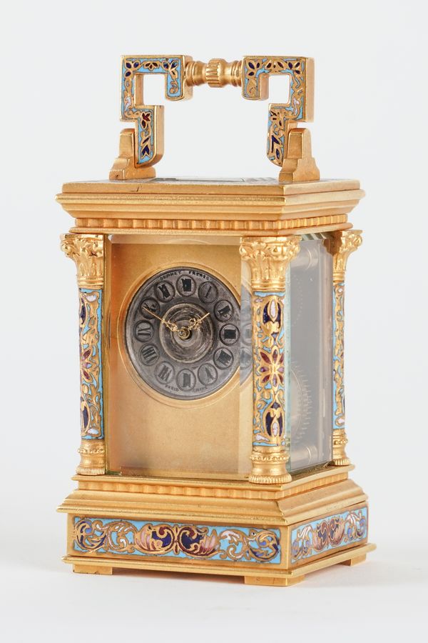 A FRENCH GILT-BRASS AND CHAMPLEVE ENAMEL MINIATURE CARRIAGE TIMEPIECE