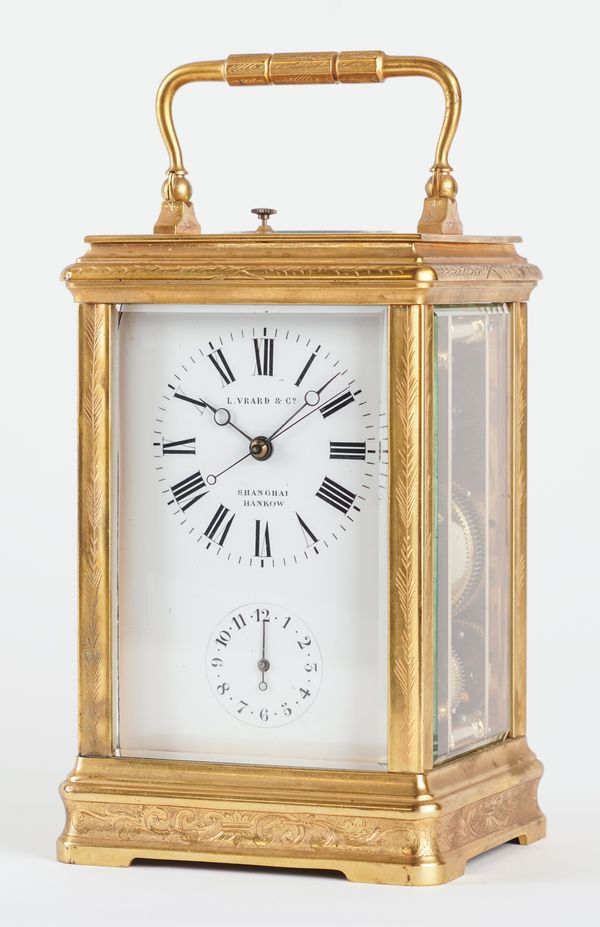 AN ENGRAVED GILT-BRASS CARRIAGE CLOCK WITH PUSH REPEAT AND ALARM FOR THE CHINESE MARKET