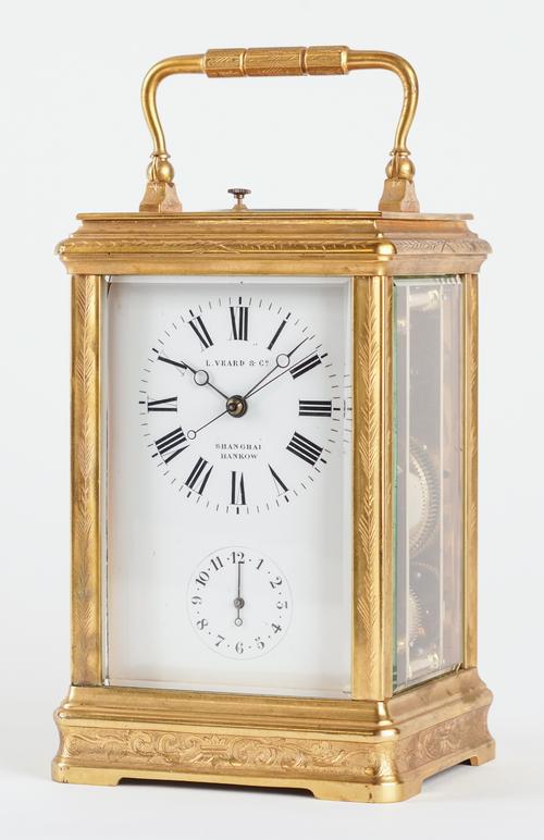 AN ENGRAVED GILT-BRASS CARRIAGE CLOCK WITH PUSH REPEAT AND ALARM FOR THE CHINESE MARKET