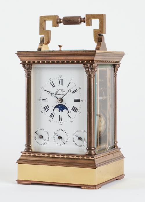A FRENCH BRASS CARRIAGE CLOCK WITH PUSH REPEAT, ALARM, MOONPHASE AND CALENDAR