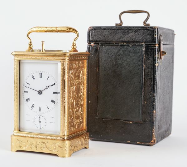 A RARE AND UNUSUAL FRENCH ENGRAVED GILT-BRASS BELL STRIKING CARRIAGE CLOCK WITH PUSH REPEAT ON A GONG AND ALARM