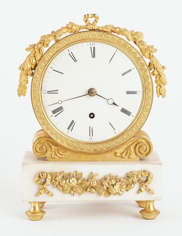 A REGENCY ORMOLU AND WHITE MARBLE MANTEL TIMEPIECE