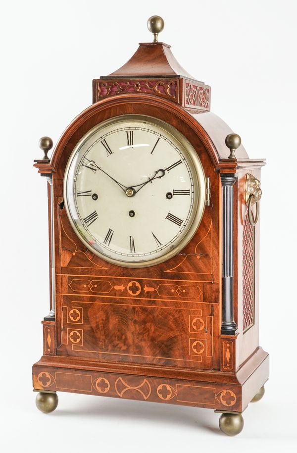 A GEORGE III MAHOGANY AND LINE-INLAID QUARTER CHIMING AND STRIKING BRACKET CLOCK