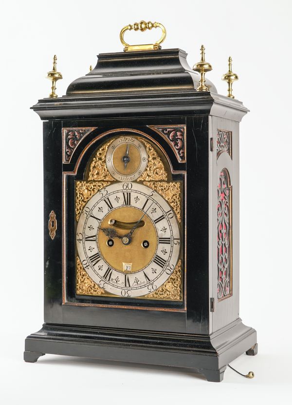 A GEORGE I BRASS-MOUNTED EBONISED QUARTER REPEATING AND STRIKING TABLE CLOCK