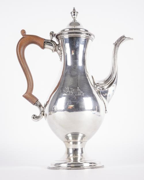A GEORGE III SILVER COFFEE POT