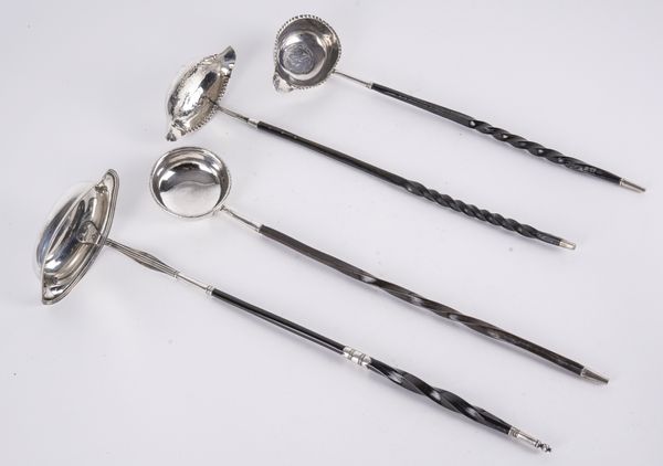 FOUR MOSTLY SILVER TODDY LADLES