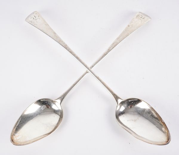 A PAIR OF GEORGE III SILVER OLD ENGLISH PATTERN STUFFING SPOONS (2)