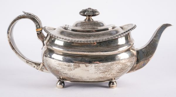 A GEORGE III SILVER TEAPOT