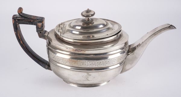 A GEORGE III SILVER TEAPOT