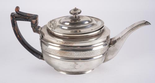 A GEORGE III SILVER TEAPOT