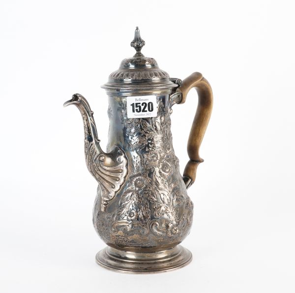 A GEORGE III SILVER COFFEE POT