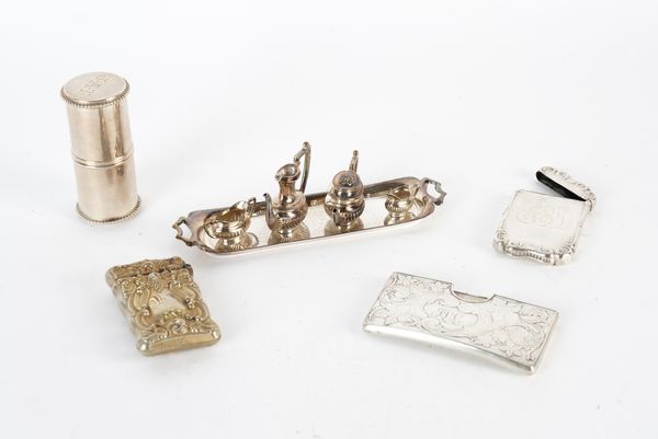 A STERLING VISITING CARD CASE, A SILVER MINIATURE TEA SET AND THREE FURTHER ITEMS (9)