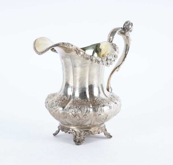 A WILLIAM IV SILVER CREAM JUG