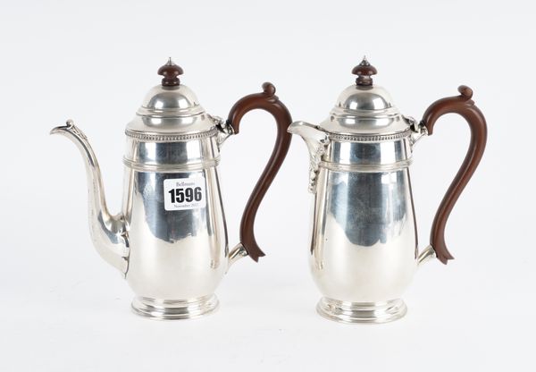 A SILVER TWO PIECE CAFE AU LAIT SET (2)