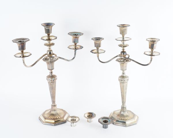 A PAIR OF PLATED THREE LIGHT TABLE CANDELABRA