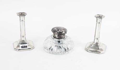 A PAIR OF SILVER CANDLESTICKS AND A SILVER MOUNTED GLASS INKWELL (3)