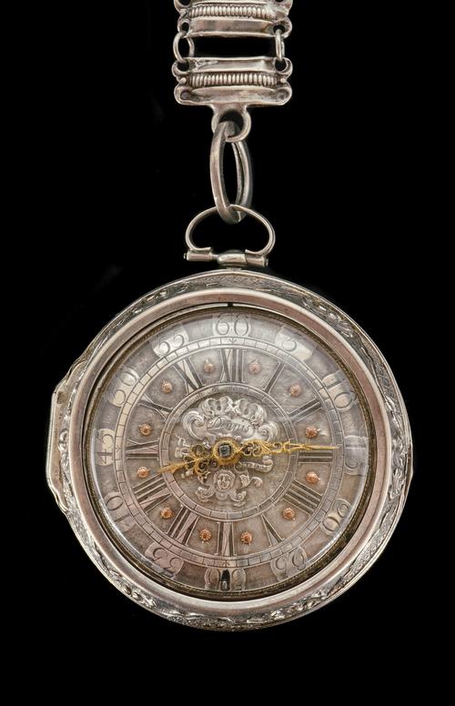 A SILVER REPOUSSÉ PAIR CASED KEY WIND OPENFACED POCKET WATCH