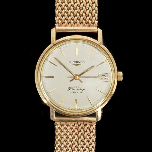 A LONGINES FLAGSHIP AUTOMATIC 9CT GOLD CASED GENTLEMAN'S WRISTWATCH