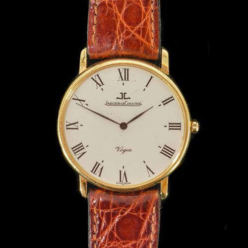 A GOLD CASED JAEGER-LECOULTRE QUARTZ WATCH