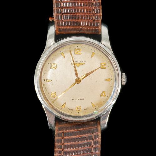 A STEEL CASED GENTLEMANS LONGINES AUTOMATIC WRISTWATCH