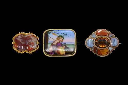 TWO GOLD MOUNTED SCOTTISH STYLE AGATE BROOCHES AND ANOTHER BROOCH (3)