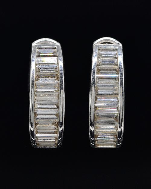 A PAIR OF BAGUETTE CUT DIAMOND EARRINGS