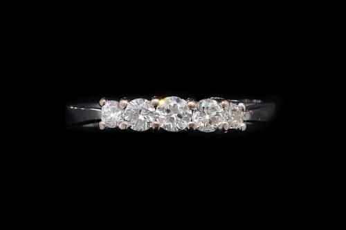 A DIAMOND FIVE STONE RING