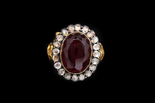 A 19TH CENTURY DIAMOND AND GARNET ECCLESIASTICAL RING