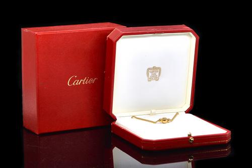 A CARTIER DIAMOND BALL NECKLACE
