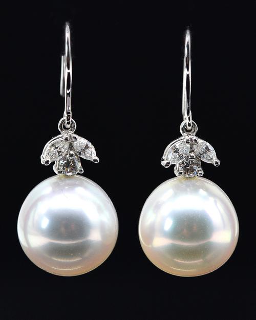 A PAIR OF CULTURED PEARL AND DIAMOND DROP EARRINGS