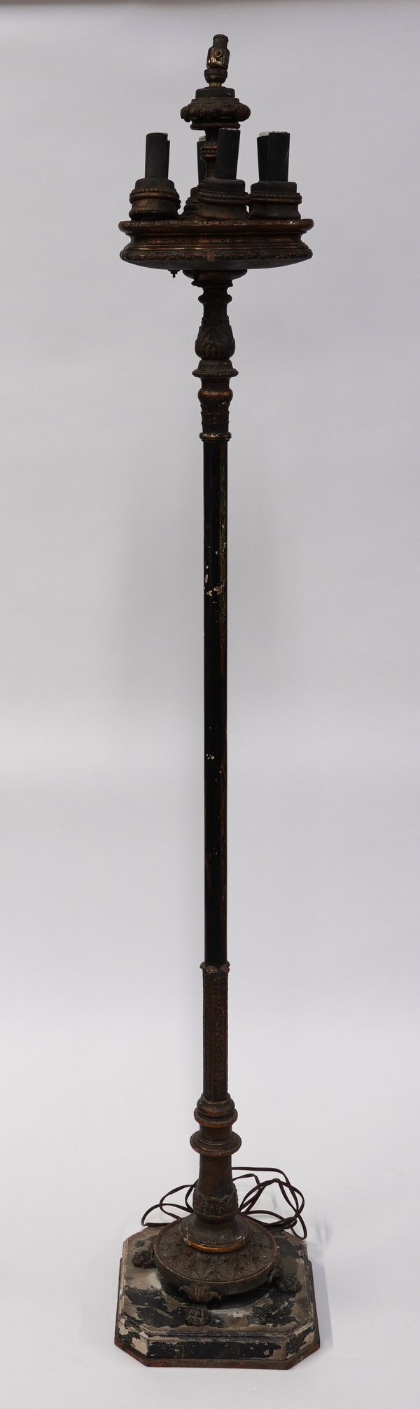 A BLACK AND PARCEL GILT DECORATED COMPOSITION SEVEN-LIGHT FLOOR STANDING LAMP
