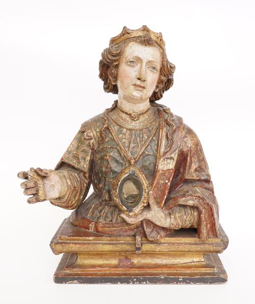 A NORTH EUROPEAN POLYCHROME SCULPTURE OF A SAINT WITH RELIQUARY
