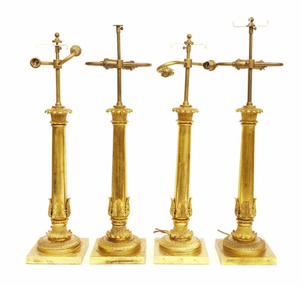 A SET OF FOUR WILLIAM IV STYLE GILT-METAL TABLE LAMPS (4)