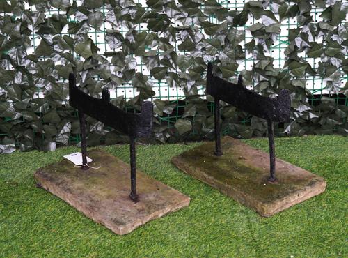 A PAIR OF BLACK PAINTED CAST IRON BOOT SCRAPERS (2)