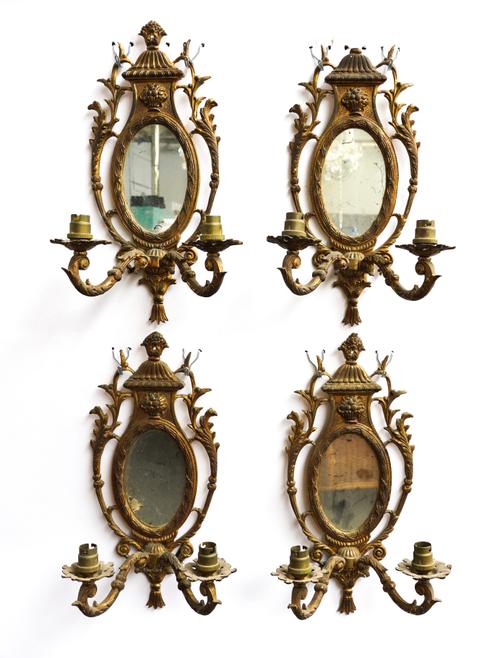 A SET OF FOUR GILT BRASS TWIN-LIGHT WALL APPLIQUES (4)