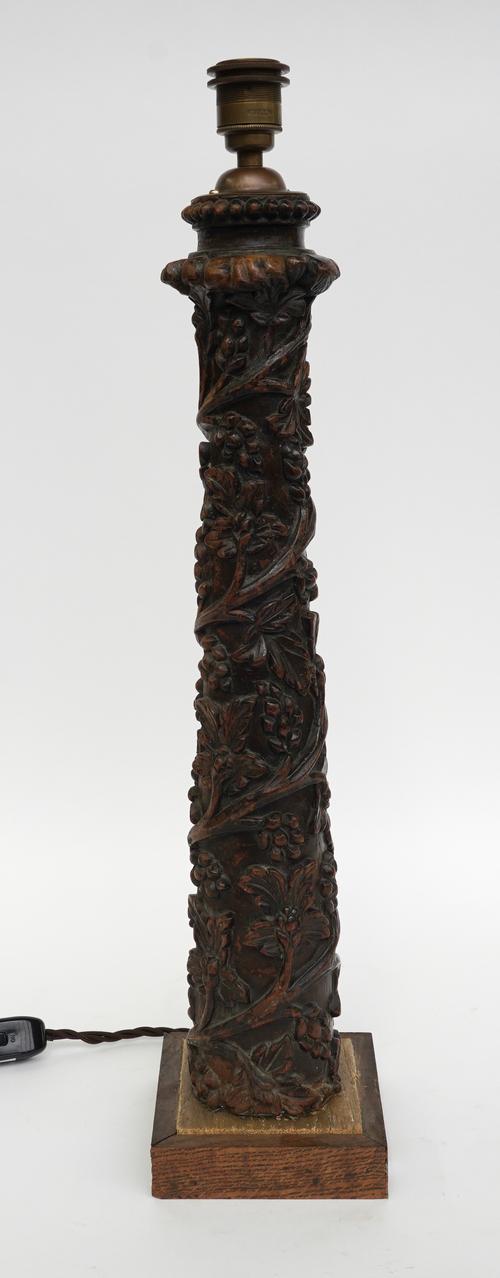 AN INDIAN RELIEF CARVED HARDWOOD COLUMN TABLE LAMP