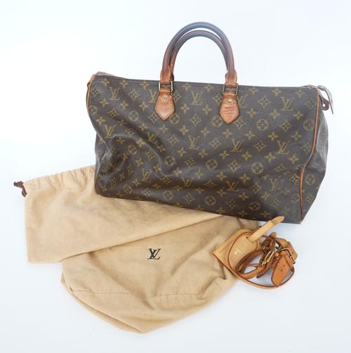 LOUIS VUITTON: A MONOGRAM LEATHER BAG