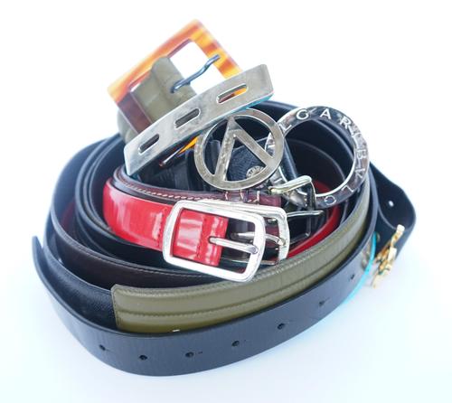 A COLLECTION OF DESIGNER BELTS BY CELINE, LORO PIANA, YVES SAINT LAURENT AND OTHERS (9)