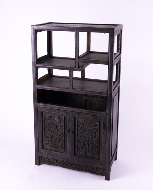 AN EARLY 20TH CENTURY CHINESE-EXPORT CARVED HARDWOOD TABLE CABINET